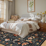 Covaba boho birdsong floral garden area rug in ink black, styled in a room setting, view 9