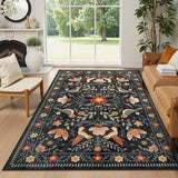 Covaba boho birdsong floral garden area rug in ink black, styled in a room setting, view 7