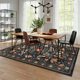 Covaba boho birdsong floral garden area rug in ink black, styled in a room setting, view 10
