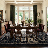 Covaba mystical snake area rug in ink black, styled in a room setting, view 3
