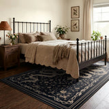 Covaba mystical snake area rug in ink black, styled in a room setting, view 8