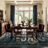 Covaba mystical snake area rug in stormy blue, styled in a room setting, view 2