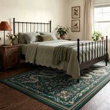 Covaba mystical snake area rug in fern green, styled in a room setting, view 6