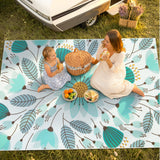 Covaba floral indoor outdoor area rug in stormy blue, styled in a room setting, view 6