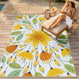 Covaba floral indoor outdoor area rug in golden wheat, styled in a room setting, view 5