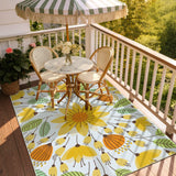 Covaba floral indoor outdoor area rug in golden wheat, styled in a room setting, view 7