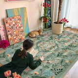 Covaba boho insect botanical floral area rug in fern green, styled in a room setting, view 5