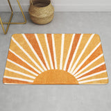 Covaba boho rainbow sunshine doormat in amber clay, styled in a room setting, view 3