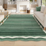 Covaba modern abstract bordered scalloped area rug in fern green, styled in a room setting, view 5