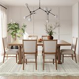 Covaba modern abstract bordered scalloped area rug in warm beige, styled in a room setting, view 8