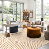 Covaba abstract rainbow stripe orange/white area rug in amber clay, styled in a room setting, view 5
