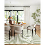 Covaba abstract rainbow stripe green/white area rug in fern green, shown flat on a plain ivory backdrop, view 10