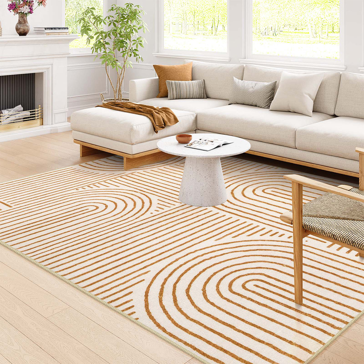 Covaba abstract rainbow stripe orange/white area rug in amber clay, styled in a room setting
