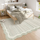 Covaba modern abstract bordered scalloped area rug in warm beige, styled in a room setting, view 6