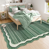 Covaba modern abstract bordered scalloped area rug in fern green, styled in a room setting, view 2