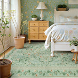 Covaba vintage floral area rug in sage mist, styled in a room setting, view 2
