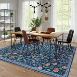 Covaba maximalism vibrant floral area rug in stormy blue, styled in a room setting, view 5