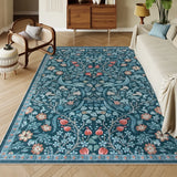 Covaba maximalism vibrant floral area rug in teal haze, styled in a room setting, view 4