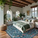 Covaba maximalism vibrant floral area rug in teal haze, styled in a room setting, view 2