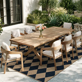Covaba geometric checkered easy jute indoor/outdoor area rug in coffee brown, styled in a room setting, view 5