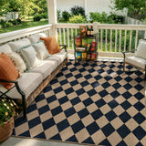 Covaba geometric checkered easy jute indoor/outdoor area rug in coffee brown, styled in a room setting, view 2