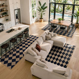 Covaba geometric checkered easy jute indoor/outdoor area rug in coffee brown, styled in a room setting, view 4