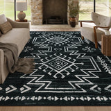 Covaba aztec moroccan distressed area rug in ink black, styled in a room setting