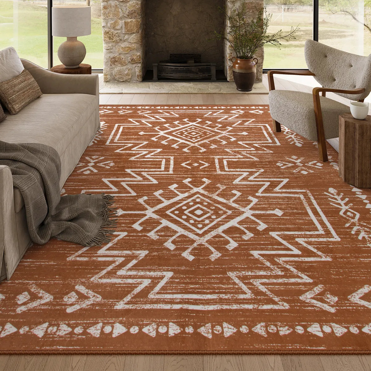 Covaba aztec moroccan distressed area rug in amber clay, styled in a room setting