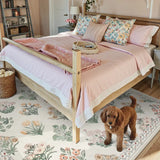 Covaba meadow floral area rug in warm beige, styled in a room setting, view 4