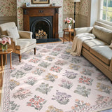 Covaba meadow floral area rug in blush clay, styled in a room setting, view 2