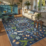 Covaba boho insect botanical floral area rug in stormy blue, styled in a room setting