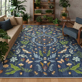Covaba boho insect botanical floral area rug in stormy blue, styled in a room setting, view 2