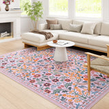 Covaba maximalism vibrant blossom floral area rug in blush clay, styled in a room setting, view 3