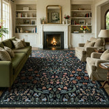 Covaba maximalism vibrant blossom floral area rug in ink black, styled in a room setting, view 3