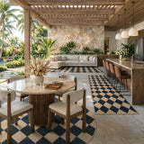 Covaba geometric checkered easy jute indoor/outdoor area rug in ink black, styled in a room setting, view 10
