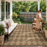 Covaba geometric checkered easy jute indoor/outdoor area rug in dune khaki, styled in a room setting, view 3