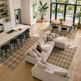 Covaba geometric checkered easy jute indoor/outdoor area rug in dune khaki, styled in a room setting