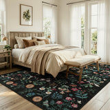 Covaba boho botanical floral area rug in ink black, styled in a room setting, view 2