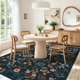 Covaba boho botanical floral area rug in stormy blue, styled in a room setting, view 4