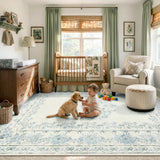 Covaba vintage traditional floral area rug in stormy blue, styled in a room setting, view 5