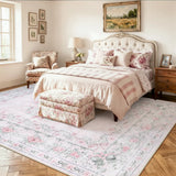 Covaba vintage traditional floral area rug in blush clay, styled in a room setting, view 2