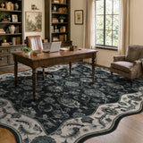 Covaba vintage botanical scalloped area rug in ink black, styled in a room setting, view 2
