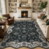 Covaba vintage botanical scalloped area rug in ink black, styled in a room setting