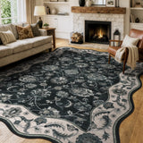 Covaba vintage botanical scalloped area rug in ink black, styled in a room setting, view 6