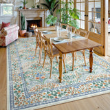 Covaba maximalism vintage french floral area rug in sage mist, styled in a room setting, view 6