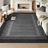 Covaba modern minimalist line area rug in ink black, styled in a room setting, view 2