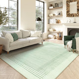 Covaba modern minimalist line area rug in fern green, styled in a room setting