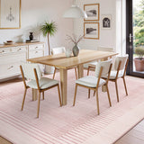 Covaba modern minimalist line area rug in blush clay, styled in a room setting, view 2