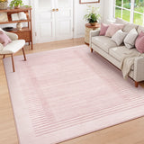 Covaba modern minimalist line area rug in blush clay, styled in a room setting, view 3