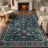 Covaba vintage floral bird royal area rug in stormy blue, styled in a room setting